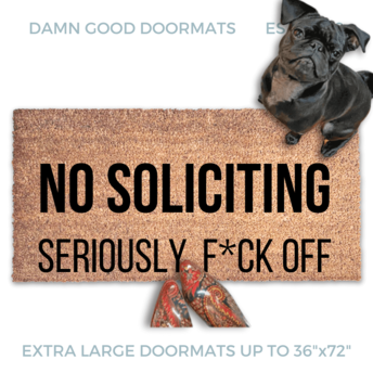 outside coir door mat reading "NO SOLICITING, Seriously Fuck Off."  with a black pug puppy looking up and a woman's feet in smurf blue boots
