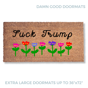 promotional image of a coir doormat reading "fuck Trump" in cursive with red and purple flowers across the top and bottom