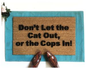dont let the cats out or the cops in funny doormat