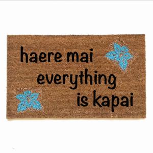 Hawaiian tiki welcome mat Haere mai everything is kapai door mat- You are here a