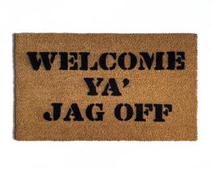Coir doormat with WELCOME YA JAG OFF text, a funny Pittsburgh welcome mat for the front door.