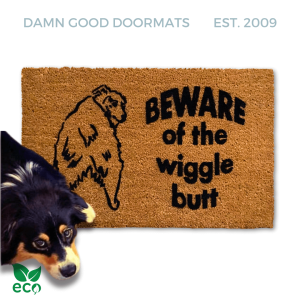 Sustainable coir doormat printed with 'Beware of the Wiggle Butt' and an Australian Shepherd for dog lovers