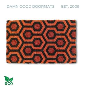 Orange and brown retro hexagon pattern doormat, eco coir welcome mat inspired by horror movie carpet design.