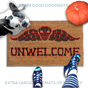 a french bulldog sitting on a welcome mat with the word "UNWELCOME" written on it in bones lettering