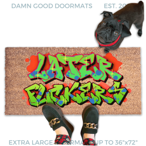 a pair of feet standing on a colorful, graffiti-style doormat with the text "LATER FUCKERS" on it. A small black pug dog is also present in the image, looking up at the person