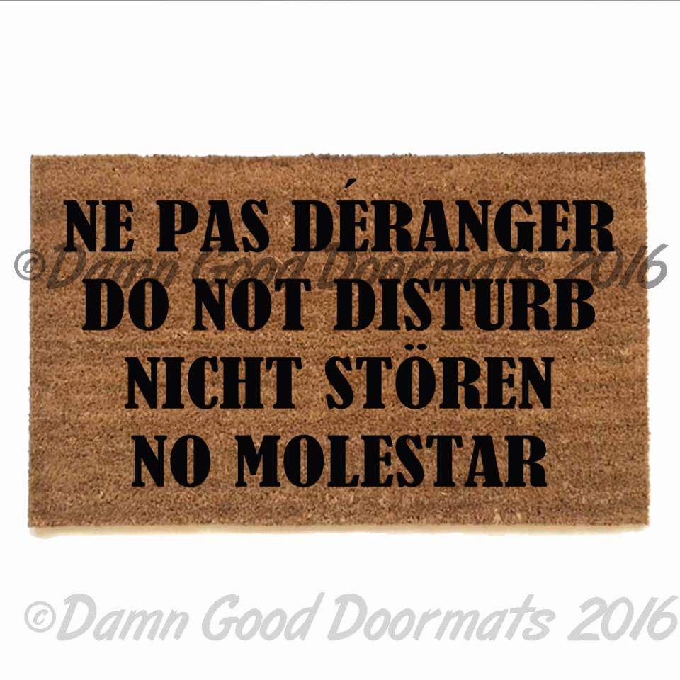Do not disturb in Spanish, French, English and German. That should getthe messag