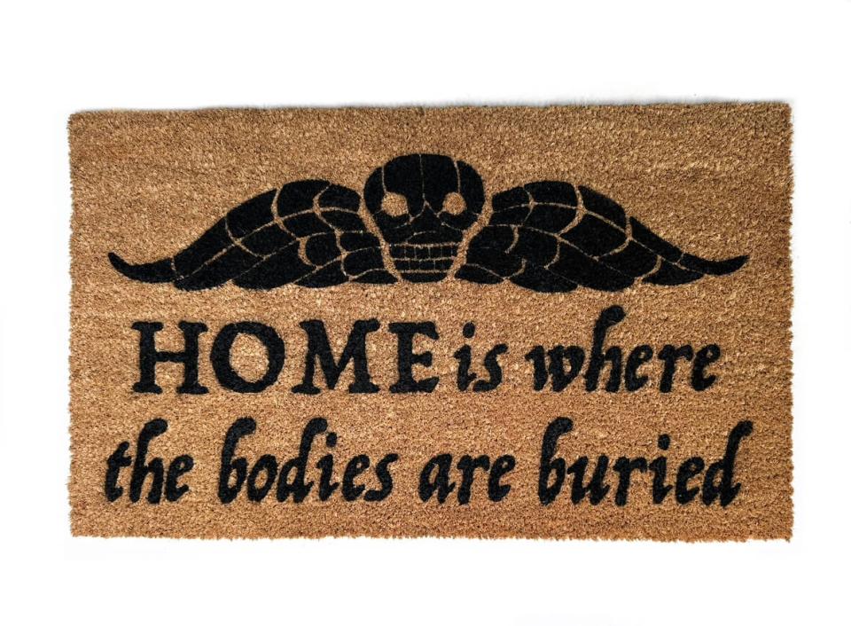  coir doormat printed "Home Is Where The Bodies Are Buried," funny welcome mat