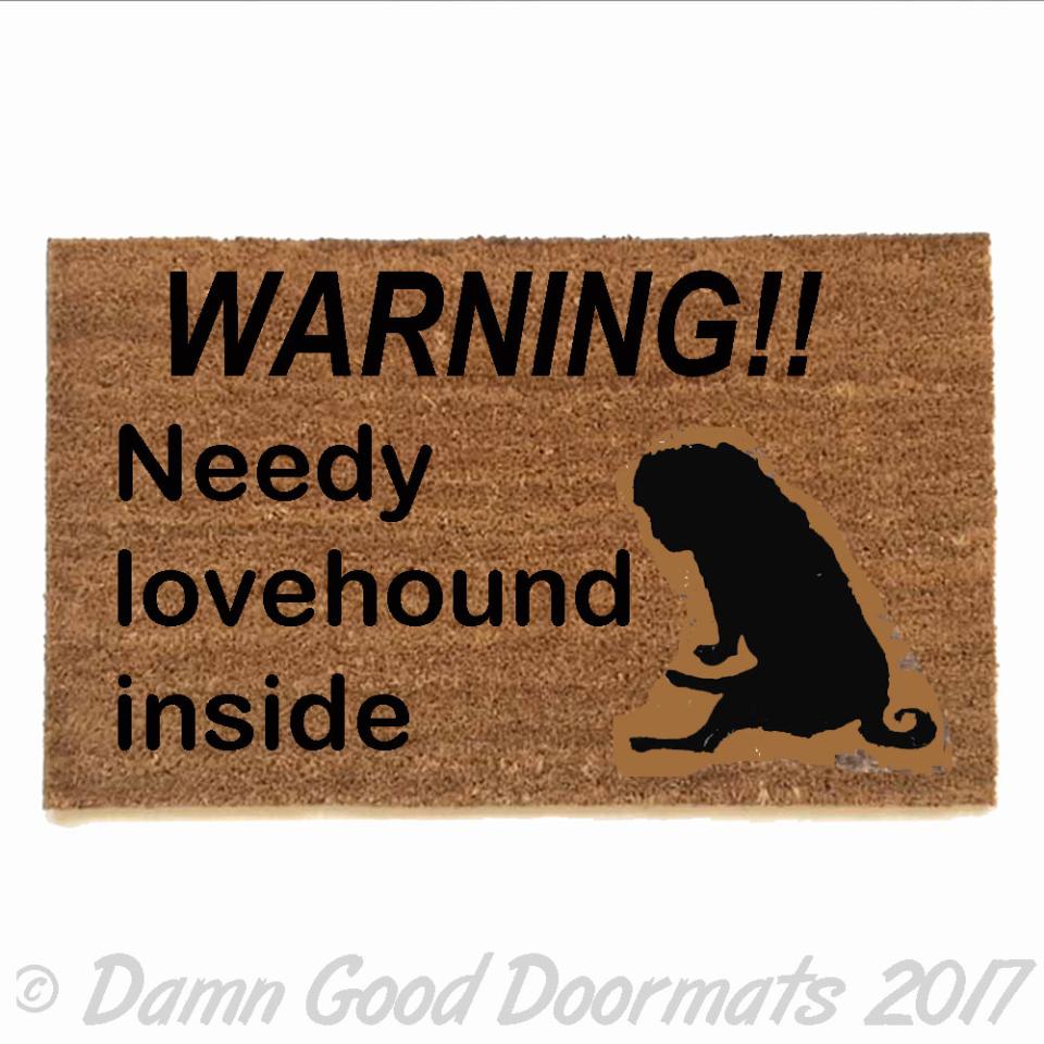 Needy Lovehound™ doormat with expressive pug illustration