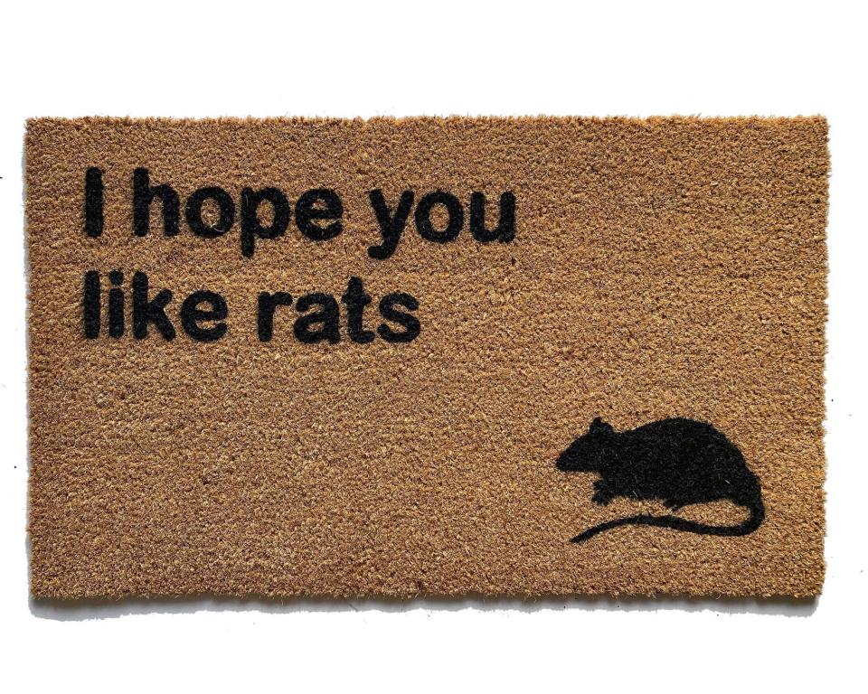 Coir welcome mat printed with 'I hope you like rats' funny doormat design