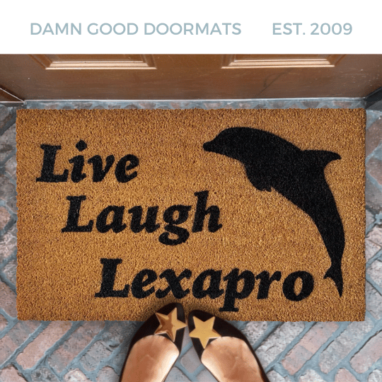 Live Laugh LEXAPRO dolphin doormat on a brick patio