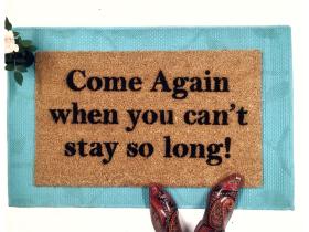 Sustainable coir doormat printed with Come Again When You Can't Stay So Long welcome mat design
