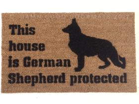 This house is German Shepard protected dog door mat