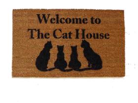 Welcome to the Cat House doormat with elegant cat design