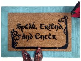 Tan coir doormat with Hobbit-lettering trees and 'Speak, Friend, and Enter' Tolkien quote, Doors of Durin design.