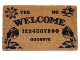 Black and white spirit board Halloween doormat with planchette design, goth welcome mat