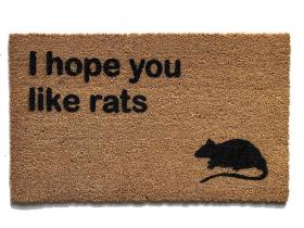 Coir welcome mat printed with 'I hope you like rats' funny doormat design
