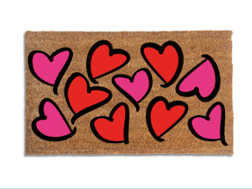 Pink and red hearts covering the entire Valentine's Day doormat
