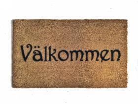 coir doormat reading "Valkommen!!" swedish for welcome