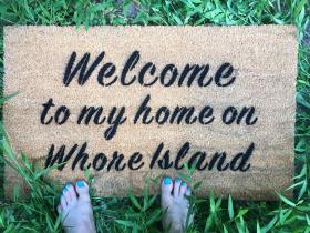 Coir welcome doormat with Whore Island Anchorman quote — funny outdoor front door mat