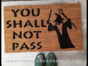 Coir doormat printed with Gandalf's You shall not pass! quote, nerdy Lord of the Rings welcome mat for the front door.