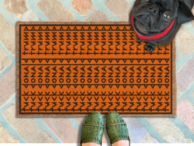 subtle fuck donald trump doormat in abstract contemporary design over orange. 