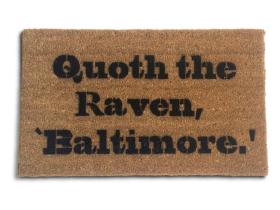 Brown coir doormat printed with a Baltimore Ravens Edgar Allan Poe quote in bold black lettering
