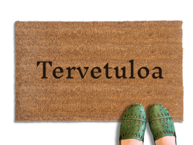 Natural coir doormat printed with Tervetuloa, the Finnish word for welcome, welcome mat for the front door