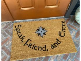 coir doormat printed with Speak Friend and Enter and the Star of Fëanor, a Tolkien welcome mat
