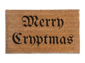 Coir doormat printed with Merry Cryptmas in black gothic blackletter